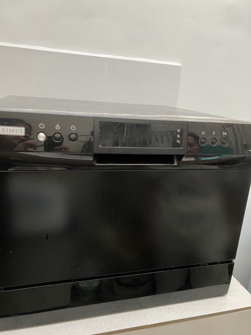 Maximus Tabletop Dishwasher (Category: Dishwasher) located in Paranaque City. Submitted by leipicks (Listing ID 1443200896, Image 1). Description: For sale, pre loved table top dishwasher from Maximus. You will see the model and specifications in the photos as taken from Maximus website. Bought 6 yrs ago, used on average once daily, and with care. New trays inside, working very well, no issues. The only small flaw is the rust on the outer side pa