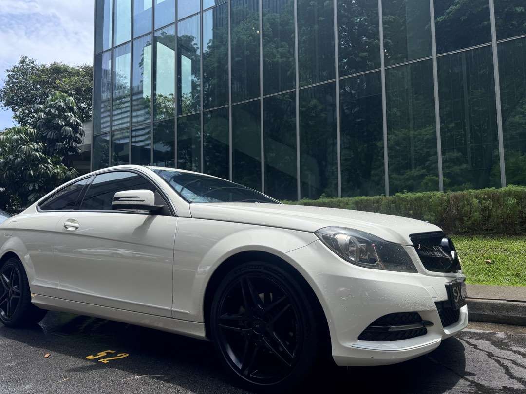Mercedes-Benz C-Class Coupe C180 (A) (Category: Used Cars) located in Singapore. Submitted by bambs19 (Listing ID 1443190751, Image 3). Description: NOT LOOKING FOR CAR DEALERS. PLEASE ONLY PM IF YOU ARE A DIRECT BUYER. Original white colour. No modifications. Took care of the car very well, it’s hard to believe it’s 15 years old now. Changed to brand new rims and tyres in 2025. Proper and regular maintenance and servicing. Have to let go due to 