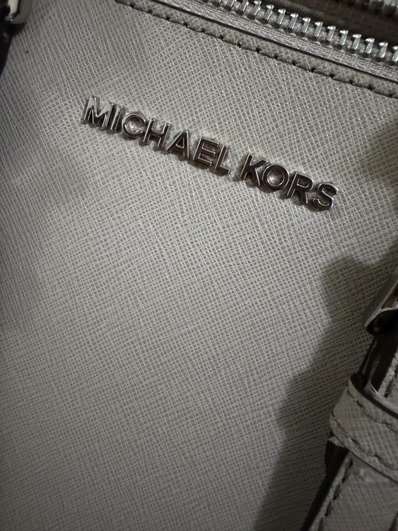 Michael Kors (Category: Luxury Bags & Wallets) located in Pateros City. Submitted by nightingayle29 (Listing ID 1443226023, Image 3). Description: - Michael Kors grey leather satchel - Detachable shoulder strap included - Multiple interior compartments for organization - Silver-tone hardware - tag still intact.