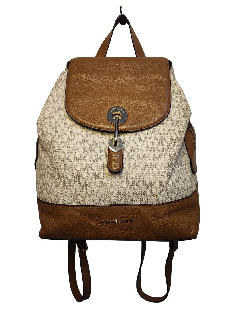 MICHAEL KORS RAVEN MEDIUM BACKPACK (Category: Backpacks) located in Iloilo. Submitted by gooddimes (Listing ID 1441763313, Image 1). Description: Michael Kors Raven Medium Backpack Authentic Leather material Snap Closure Three pockets Vanilla/Acorn/Gold color Issue/s: Minimal stain Color rate: 9.5/10 Good condition ₱1,500 Reminders: - All items are thrifted, please manage your expectations - Color may vary due to lighting - Please wash before usi