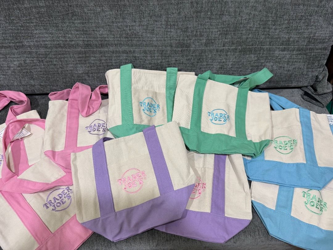 Mini Tote Trader Joe's Pastel (Category: Tote Bags) located in Quezon City. Submitted by trainforless (Listing ID 1443139162, Image 1). Description: FROM NEW YORK!! ALL COLORS AVAILABLE, 600 EACH :) Snagged this highly sought-after, limited-edition mini tote! Perfect for quick errands, lunch dates, or as a cute everyday micro-bag. Sturdy canvas material with the iconic Trader Joe's embroidery. Condition: 100% Brand New with Tags (BNWT) Material: 
