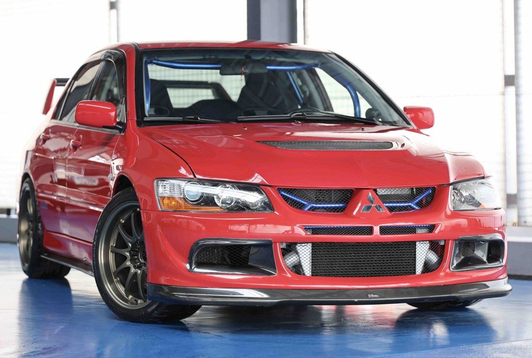 Mitsubishi Lancer Evolution VIII (M) (Category: Used Cars) located in Quezon City. Submitted by marcars_trading (Listing ID 1443216308, Image 1). Description: 2002’s Mitsubishi LANCER EVOLUTION 8 2.480M (neg) trade in ok Collectors item! FULLY LOADED with 1.5M worth of SET UP and ACCESSORIES! Condition is GUARANTEED IMMACULATE and VERY FRESH It’s a must see to BELIEVE and COMPARE - Original CT9A chassis indicated - Color: RED - 2.0L TurboCharged 