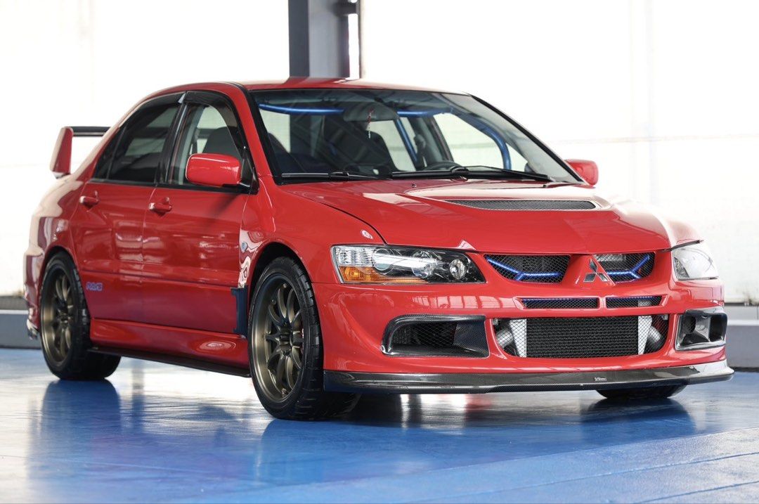 Mitsubishi Lancer Evolution VIII (M) (Category: Used Cars) located in Quezon City. Submitted by marcars_trading (Listing ID 1443216308, Image 2). Description: 2002’s Mitsubishi LANCER EVOLUTION 8 2.480M (neg) trade in ok Collectors item! FULLY LOADED with 1.5M worth of SET UP and ACCESSORIES! Condition is GUARANTEED IMMACULATE and VERY FRESH It’s a must see to BELIEVE and COMPARE - Original CT9A chassis indicated - Color: RED - 2.0L TurboCharged 