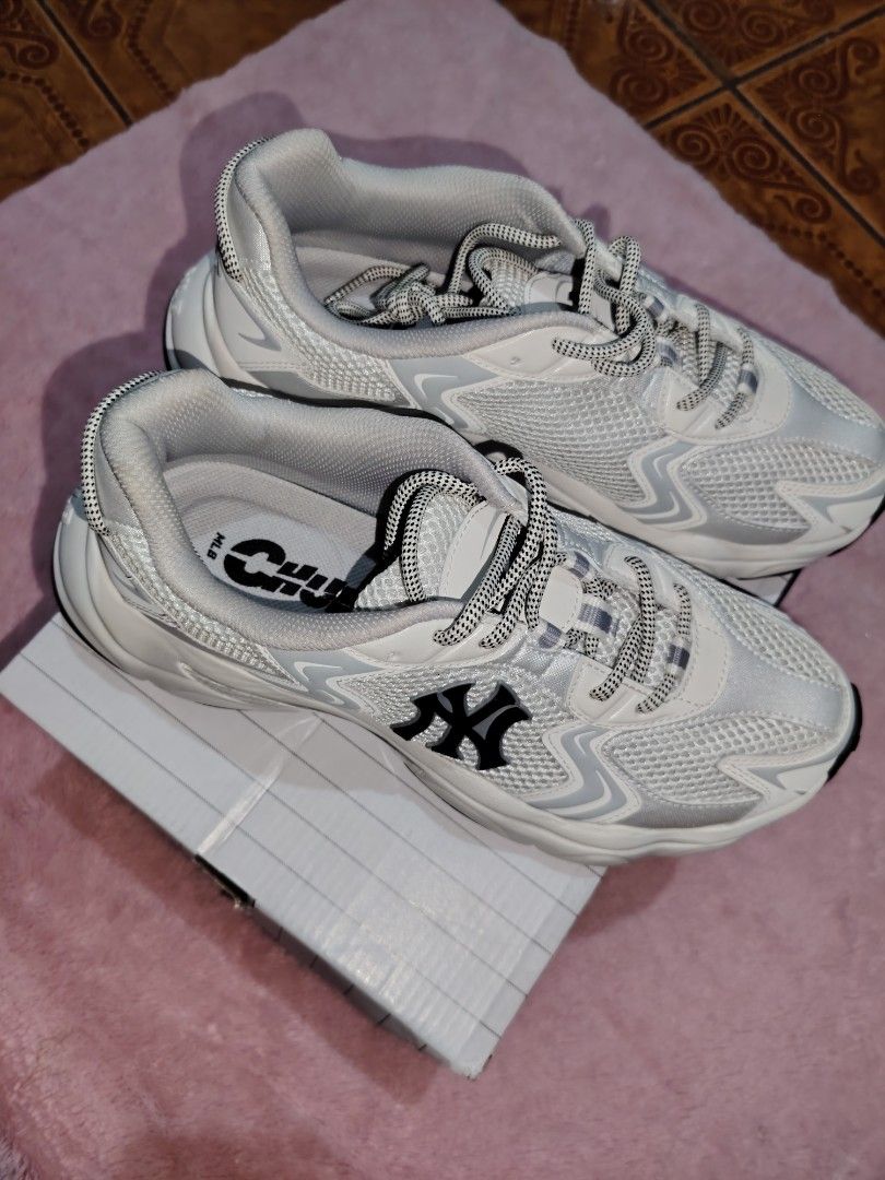 MLB New York Yankees Cargo Chunky (Category: Sneakers) located in Taguig. Submitted by rtk06 (Listing ID 1443300702, Image 2). Description: - White MLB sneakers featuring the iconic New York Yankees logo. - Trendy chunky sole design for a modern look. - Breathable mesh upper keeps your feet cool and comfortable. - Grey and white laces add a stylish detail. - Includes the original MLB shoe box. - Ideal for everyday casual wear. -also available in 