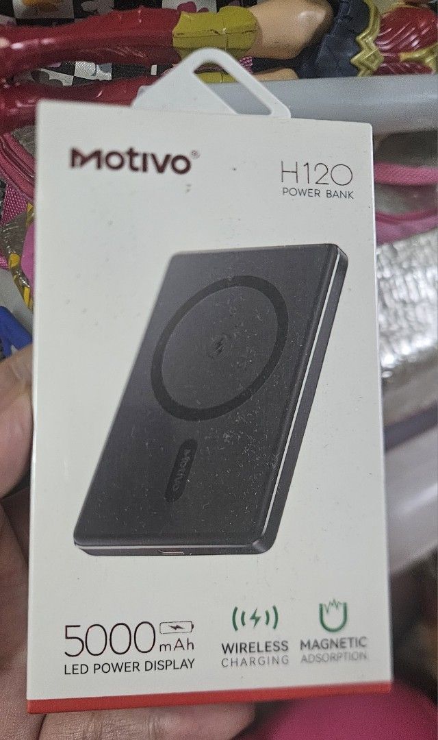 Motivo powerbank (Category: Batteries & Power Banks) located in Rodriguez. Submitted by Branded100 (Listing ID 1443251142, Image 1). Description: - Brand: Motivo - Model: H120 Power Bank - Capacity: 5000mAh - Features: Wireless Charging, Magnetic Adsorption - Display: LED Digital Display for battery level - Input/Output: Type-C PD 20W - Material: ABS + Aluminum Alloy - Safety: Overcharge, Overcurrent, Discharge, Short-Circuit, Over Voltage, Over 