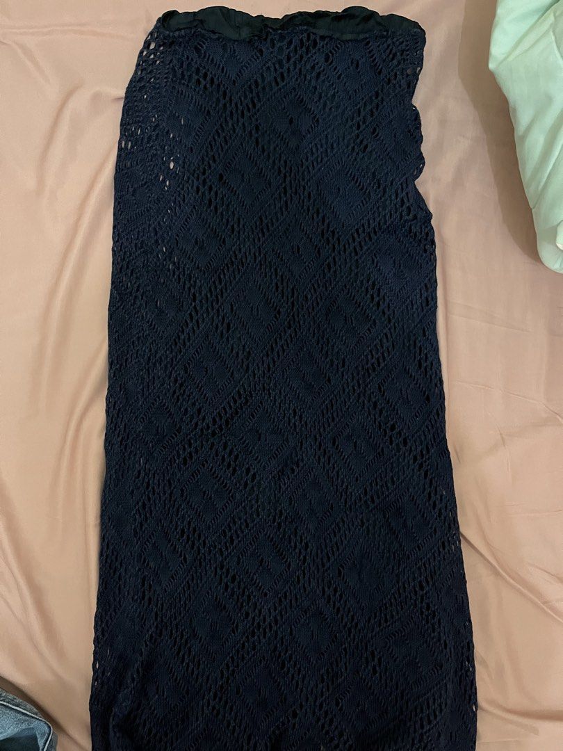 Navy blue crochet maxi skirt (Category: Skirts) located in Tuguegarao City. Submitted by declutterf (Listing ID 1443270754, Image 2). Description: Can be worn in the beach or city Perf for curvy girls Actual when worn first pic Fits 24-26 would keep but it doesnt fit me anymore.