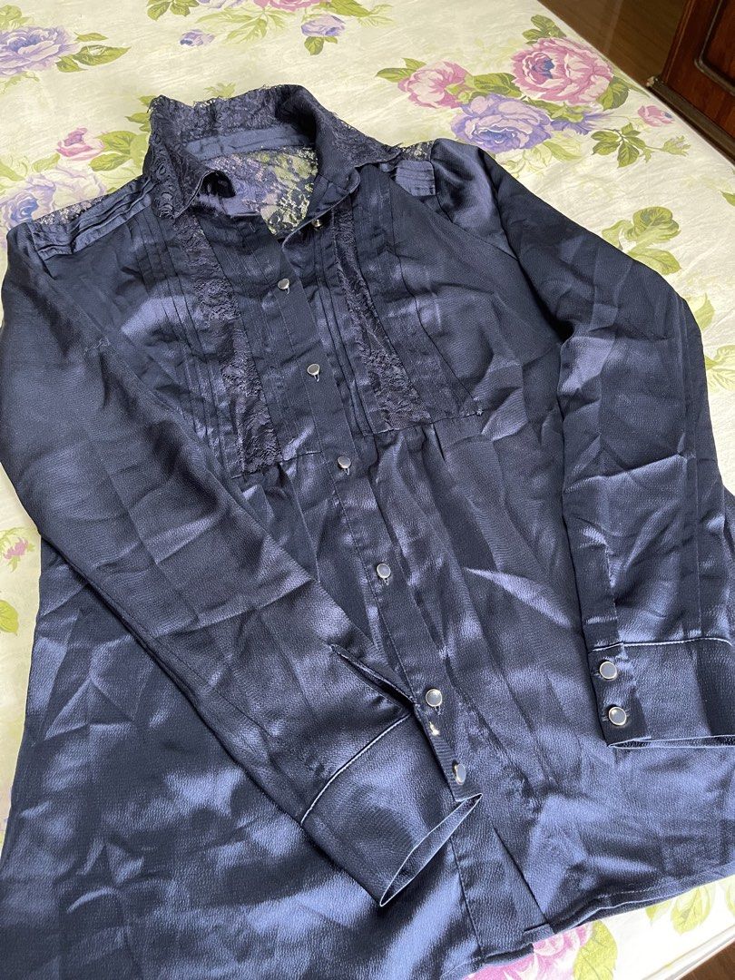 Navy Blue Satin Lace Button-Up Shirt (Category: Shirts) located in Manila. Submitted by anicascloset (Listing ID 1443129840, Image 2). Description: - Chic navy blue satin shirt - Delicate lace detailing on collar and front placket - Long sleeves with button cuffs - Classic button-up front closure - Luxurious fabric with a beautiful sheen - Effortlessly transitions from day to night - Perfect for office wear or a night out.