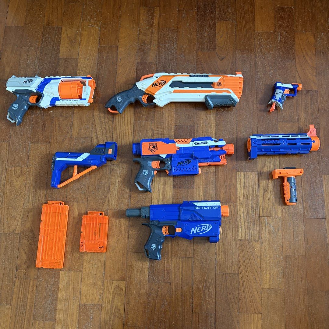 Nerf Blaster Bundle (Category: Action & Battle Toys) located in Singapore. Submitted by needamaxwin (Listing ID 1443193130, Image 1). Description: Nerf N-Strike Elite Stryfe Fully functional motorised blaster. Some light scuff marks from normal use, no cracks or broken parts. Compatible with all N-Strike Elite attachments and magazines. Batteries not included. Price: $20 (ONLY Blaster) Nerf N-Strike Elite Retaliator Fully functional pump action b