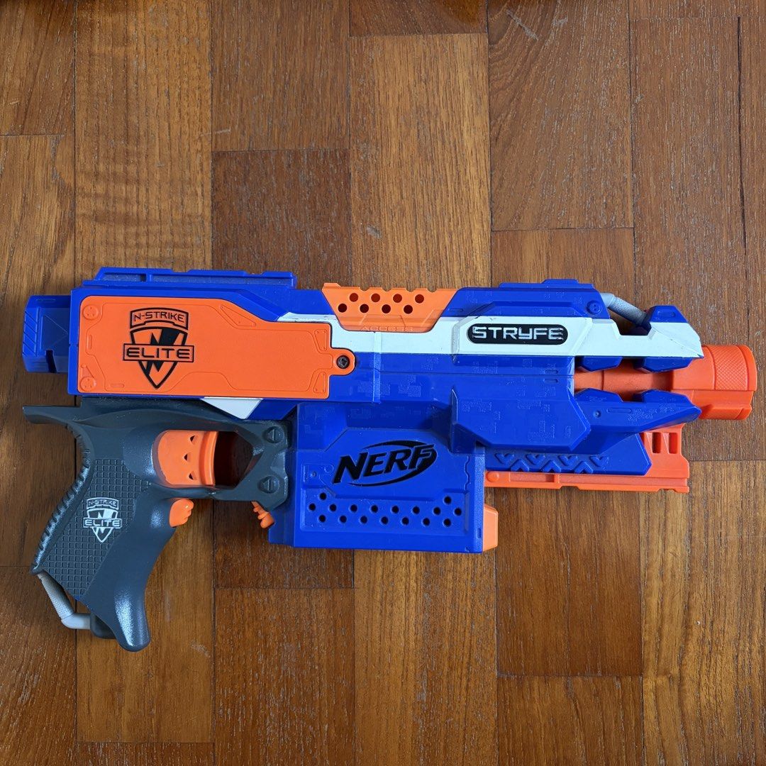 Nerf Blaster Bundle (Category: Action & Battle Toys) located in Singapore. Submitted by needamaxwin (Listing ID 1443193130, Image 2). Description: Nerf N-Strike Elite Stryfe Fully functional motorised blaster. Some light scuff marks from normal use, no cracks or broken parts. Compatible with all N-Strike Elite attachments and magazines. Batteries not included. Price: $20 (ONLY Blaster) Nerf N-Strike Elite Retaliator Fully functional pump action b