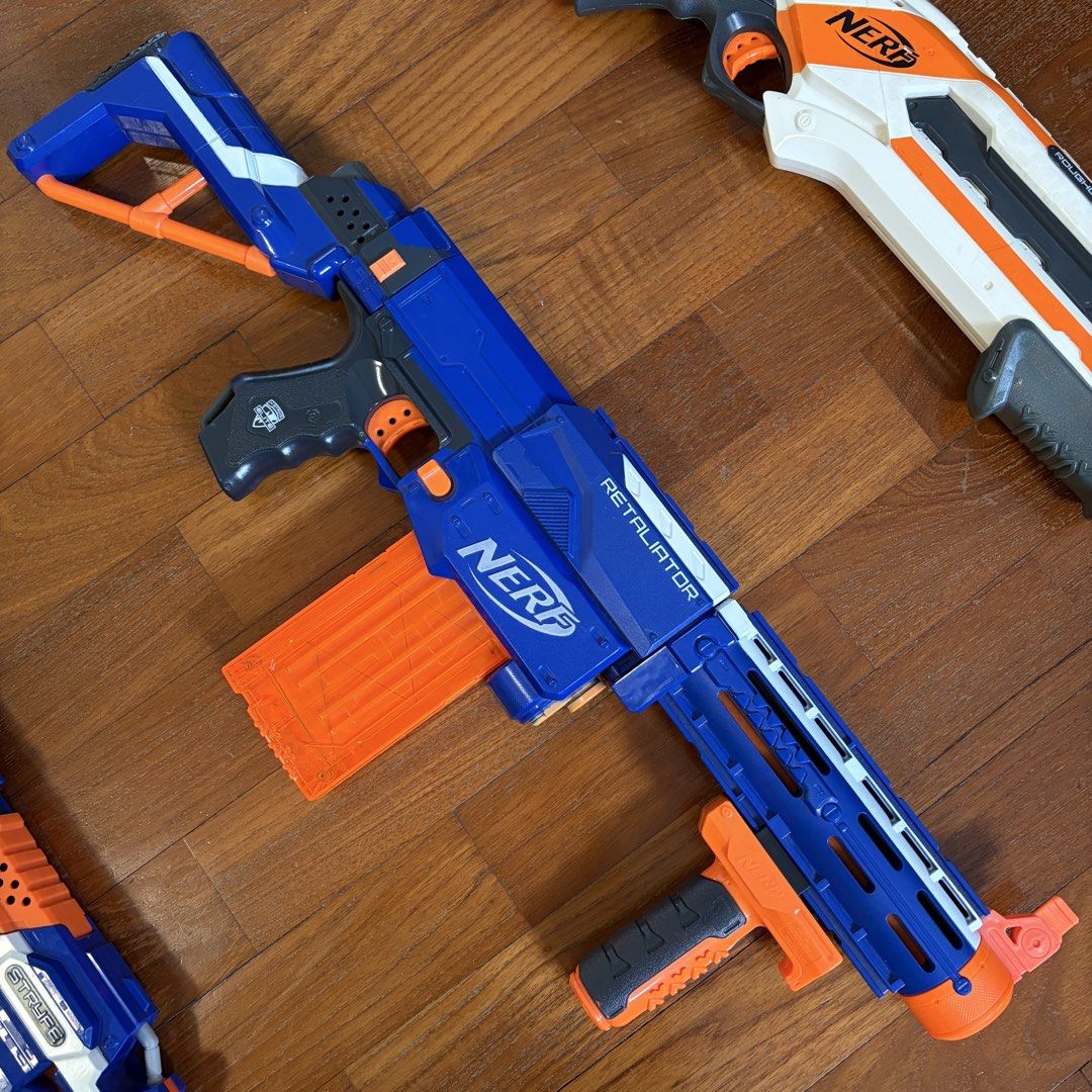 Nerf Blaster Bundle (Category: Action & Battle Toys) located in Singapore. Submitted by needamaxwin (Listing ID 1443193130, Image 5). Description: Nerf N-Strike Elite Stryfe Fully functional motorised blaster. Some light scuff marks from normal use, no cracks or broken parts. Compatible with all N-Strike Elite attachments and magazines. Batteries not included. Price: $20 (ONLY Blaster) Nerf N-Strike Elite Retaliator Fully functional pump action b