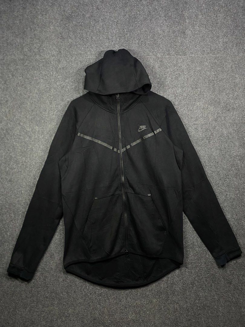 Nike Tech Fleece Full Zip Hoodie Black (Category: Coats, Jackets and Outerwear) located in Bolinao. Submitted by frenced28 (Listing ID 1443263113, Image 1). Description: Wide:22 length:28 front / 32 back - Black Nike Tech Fleece full zip hoodie - Classic chevron design - Subtle Nike logo - Two front zip pockets - Adjustable hood - Ideal for everyday wear or workouts.