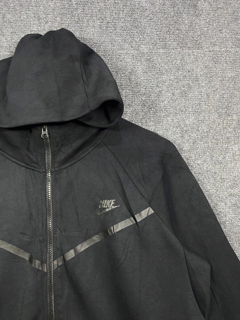 Nike Tech Fleece Full Zip Hoodie Black (Category: Coats, Jackets and Outerwear) located in Bolinao. Submitted by frenced28 (Listing ID 1443263113, Image 2). Description: Wide:22 length:28 front / 32 back - Black Nike Tech Fleece full zip hoodie - Classic chevron design - Subtle Nike logo - Two front zip pockets - Adjustable hood - Ideal for everyday wear or workouts.