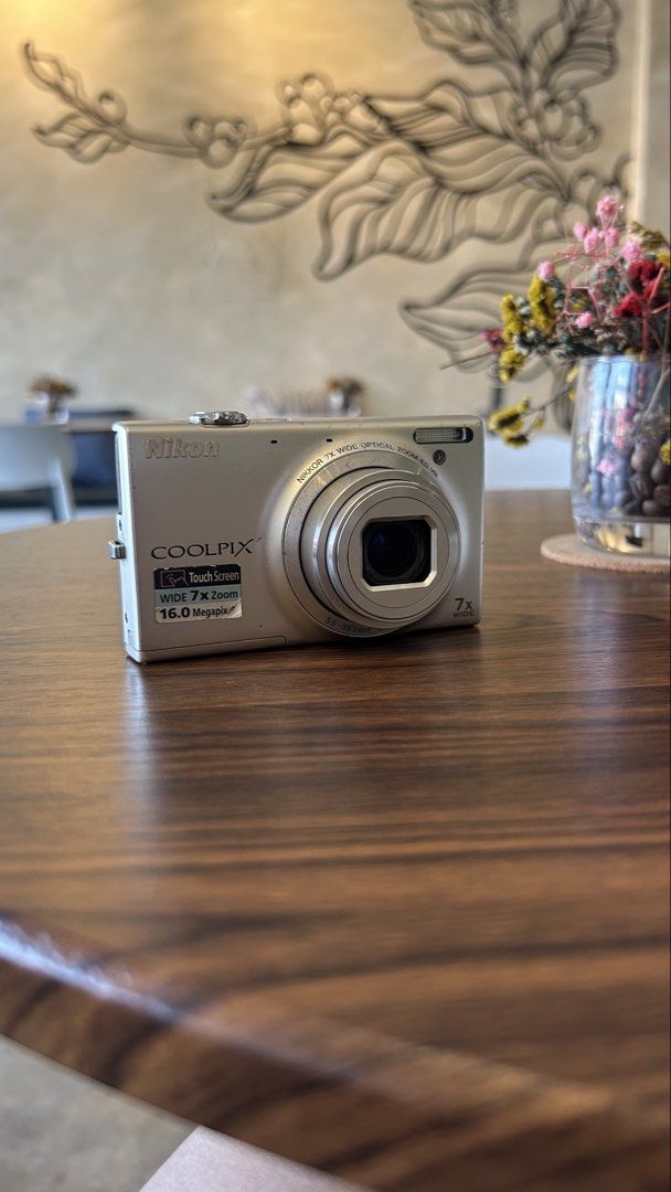 Nikon Coolpix S6100 digicam digital camera (Category: Cameras) located in Lagonoy. Submitted by nadayojiii (Listing ID 1443212148, Image 3). Description: Nikon Coolpix S6100✨ NO FUNCTIONAL ISSUES all working zoom working flash working has lcd flaws(output not affected) no lens curtain(performance not affected) TOUCH SCREEN✨ SUPER CRISP SHOTS🌅✨ COMPLETE SET Inclusions: unit battery charger sd card strap stickers.