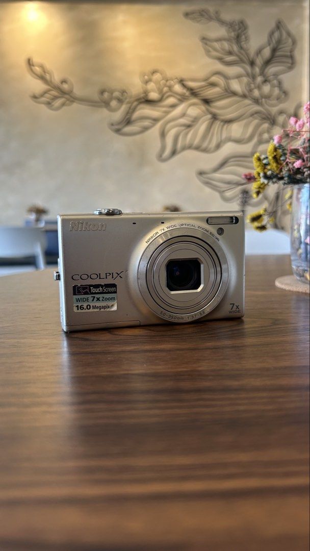Nikon Coolpix S6100 digicam digital camera (Category: Cameras) located in Lagonoy. Submitted by nadayojiii (Listing ID 1443212148, Image 2). Description: Nikon Coolpix S6100✨ NO FUNCTIONAL ISSUES all working zoom working flash working has lcd flaws(output not affected) no lens curtain(performance not affected) TOUCH SCREEN✨ SUPER CRISP SHOTS🌅✨ COMPLETE SET Inclusions: unit battery charger sd card strap stickers.