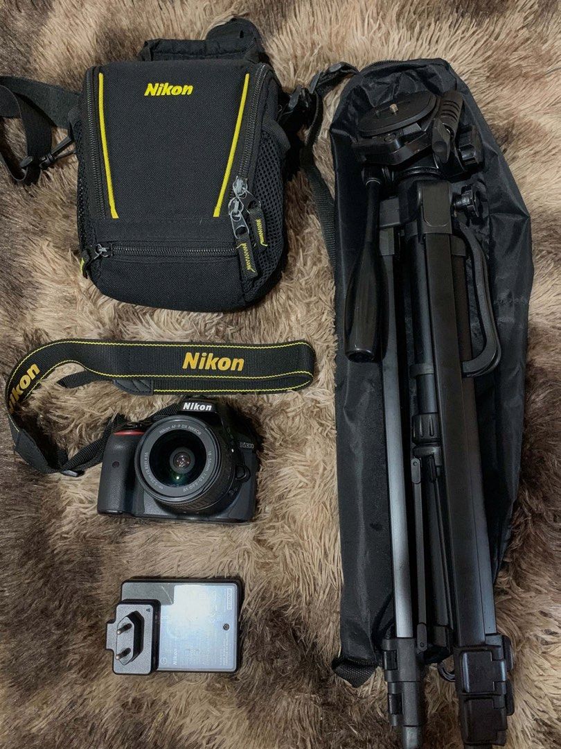 Nikon D5300 DSLR Camera with Lens, Bag, Tripod (Category: Cameras) located in Manila. Submitted by ionajjj (Listing ID 1443180973, Image 1). Description: 📸 Nikon D5300 DSLR Camera Bundle – Excellent Condition Selling my Nikon D5300 DSLR Camera. Seldom used and well-maintained. Everything is in excellent working condition with no issues. Perfect for beginners, students, hobbyists, or anyone looking to get into photography. Inclusions: ✅ Nikon D53