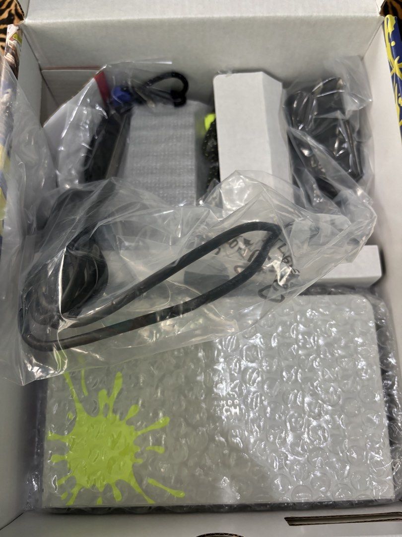 Nintendo Switch OLED Splatoon 3 Edition Console + Accessories (Category: Nintendo) located in Dagupan City. Submitted by swittut12 (Listing ID 1443129071, Image 2). Description: - Nintendo Switch OLED Splatoon 3 Edition - Includes original box and all accessories - Comes with Satisfye ZenGrip Pro - Includes a clear protective case Unit, 2 Joycons, Dock, Joycon Straps, Joycon Non Charge Grip, HDMI Cord, AC Adapter, Box No hidden defect, Never been