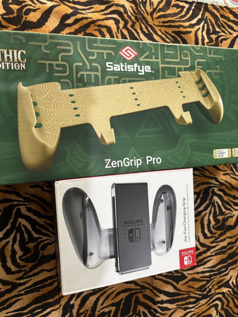 Nintendo Switch OLED Splatoon 3 Edition Console + Accessories (Category: Nintendo) located in Dagupan City. Submitted by swittut12 (Listing ID 1443129071, Image 3). Description: - Nintendo Switch OLED Splatoon 3 Edition - Includes original box and all accessories - Comes with Satisfye ZenGrip Pro - Includes a clear protective case Unit, 2 Joycons, Dock, Joycon Straps, Joycon Non Charge Grip, HDMI Cord, AC Adapter, Box No hidden defect, Never been