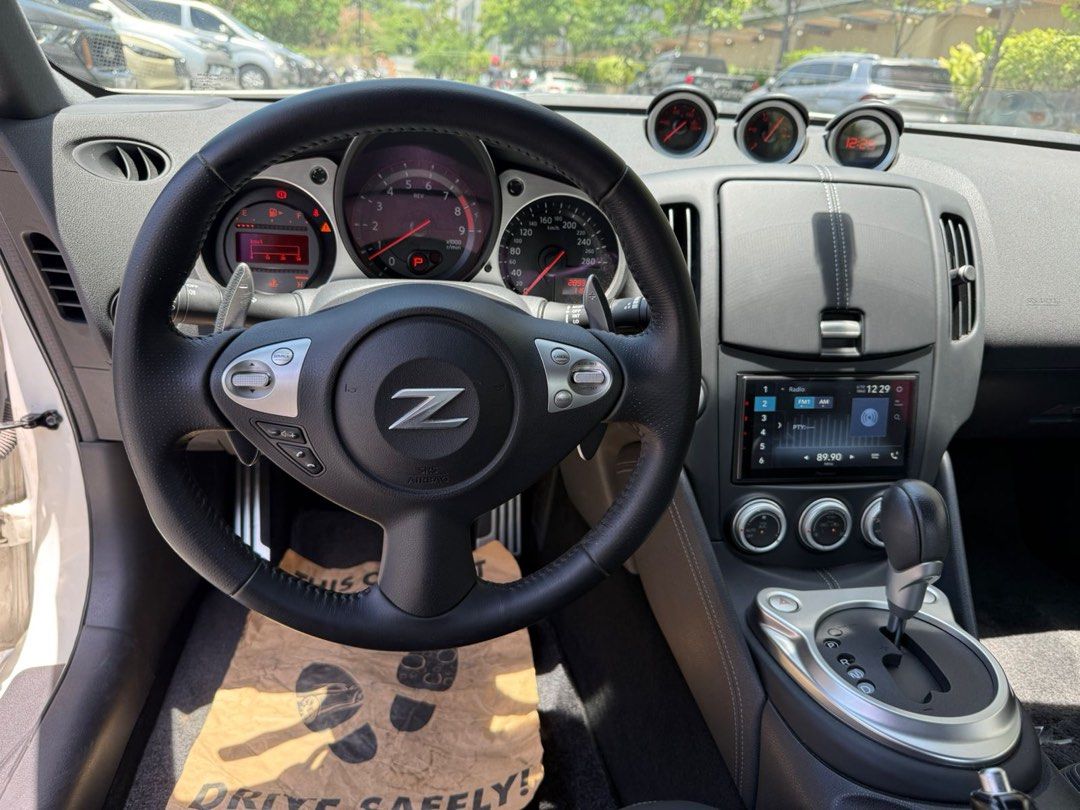 Nissan 370Z 2021 jackani Auto (Category: Used Cars) located in Pasig City. Submitted by jackani (Listing ID 1443137094, Image 3). Description: 1st owned A/T low mileage casa maintained maxton lip spoiler carbon fiber chin carbon fiber side skirts carbon fiber diffuser 400Z OEM Wheels original paint U can call 09173295586.