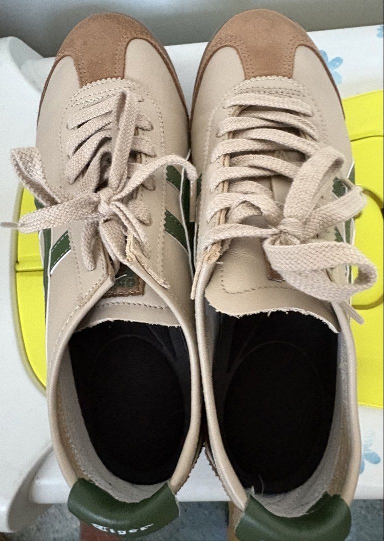Onitsuka Tiger Mexico 66 Beige Green Suede Sneakers (Category: Sneakers) located in Singapore. Submitted by liu800 (Listing ID 1443316623, Image 1). Description: - Classic Onitsuka Tiger Mexico 66 sneakers - Beige and brown suede with iconic green stripes - Perfect for casual, everyday wear - Durable soles with excellent grip - Comes with beige laces - A stylish addition to any outfit - Size is US 6.5 & 24.5cm.