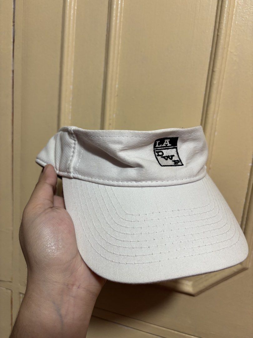 Polo Ralph Lauren Cap & LA Dodgers Visor (Category: Caps & Hats) located in Manila. Submitted by myrnabpi (Listing ID 1443137688, Image 2). Description: - Bundle includes: 1 Brown Polo Ralph Lauren cap with white logo - Bundle includes: 1 White LA Dodgers visor with black logo - Perfect headwear additions to your collection - Great value for two stylish caps.