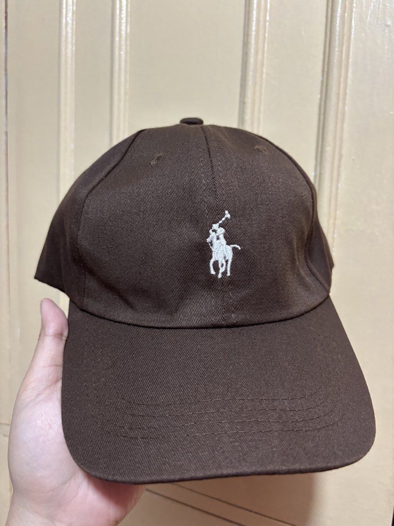 Polo Ralph Lauren Cap & LA Dodgers Visor (Category: Caps & Hats) located in Manila. Submitted by myrnabpi (Listing ID 1443137688, Image 1). Description: - Bundle includes: 1 Brown Polo Ralph Lauren cap with white logo - Bundle includes: 1 White LA Dodgers visor with black logo - Perfect headwear additions to your collection - Great value for two stylish caps.