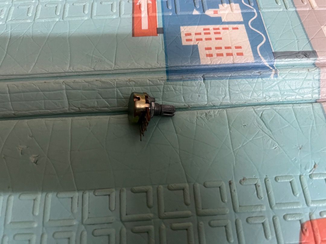 Potentiometer Variable Resistor Electronic Component (Category: Electrical, Adaptors & Sockets) located in Singapore. Submitted by sundarmaha (Listing ID 1443253283, Image 3). Description: - Potentiometer (Variable Resistor) - Ideal for electronics DIY & repairs - Features 3 connection terminals - Knurled shaft for easy grip - Tested and working.