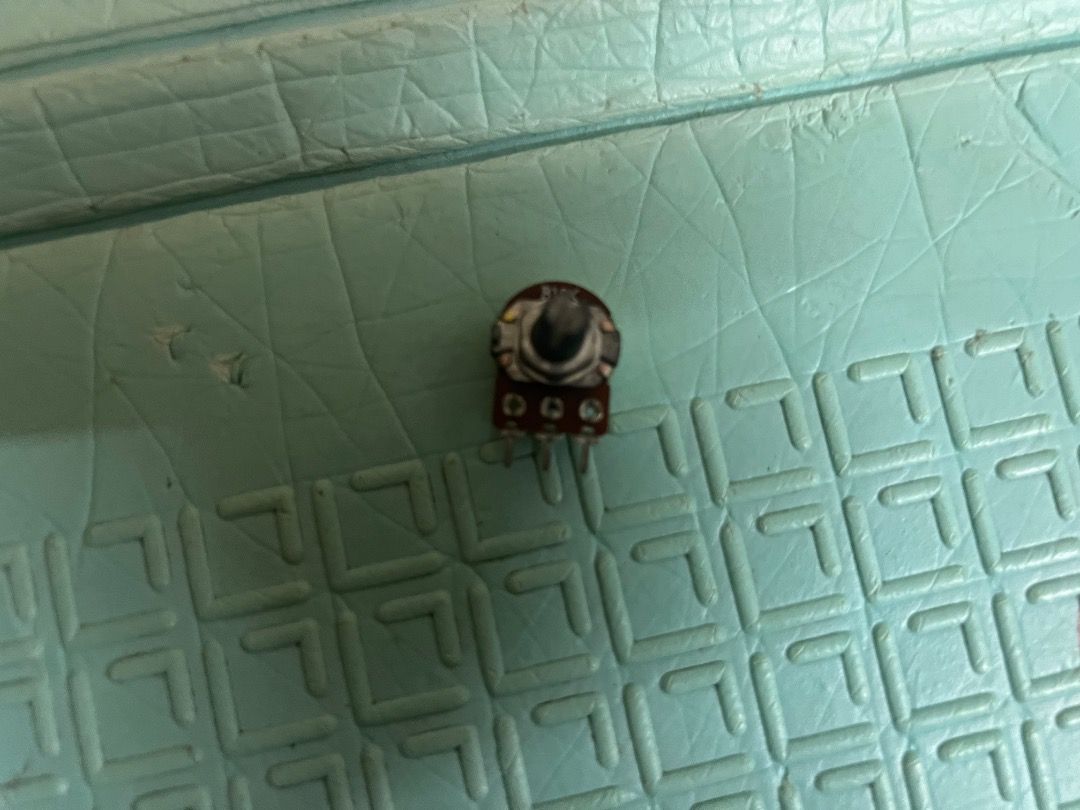 Potentiometer Variable Resistor Electronic Component (Category: Electrical, Adaptors & Sockets) located in Singapore. Submitted by sundarmaha (Listing ID 1443253283, Image 1). Description: - Potentiometer (Variable Resistor) - Ideal for electronics DIY & repairs - Features 3 connection terminals - Knurled shaft for easy grip - Tested and working.