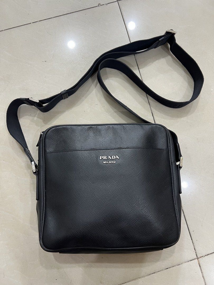 Prada Milano Messenger Bag (Category: Luxury Bags & Wallets) located in Bacolod City. Submitted by novymae23 (Listing ID 1443142416, Image 1). Description: Prada Milano Messenger Bag Size Medium Excellent Condition .