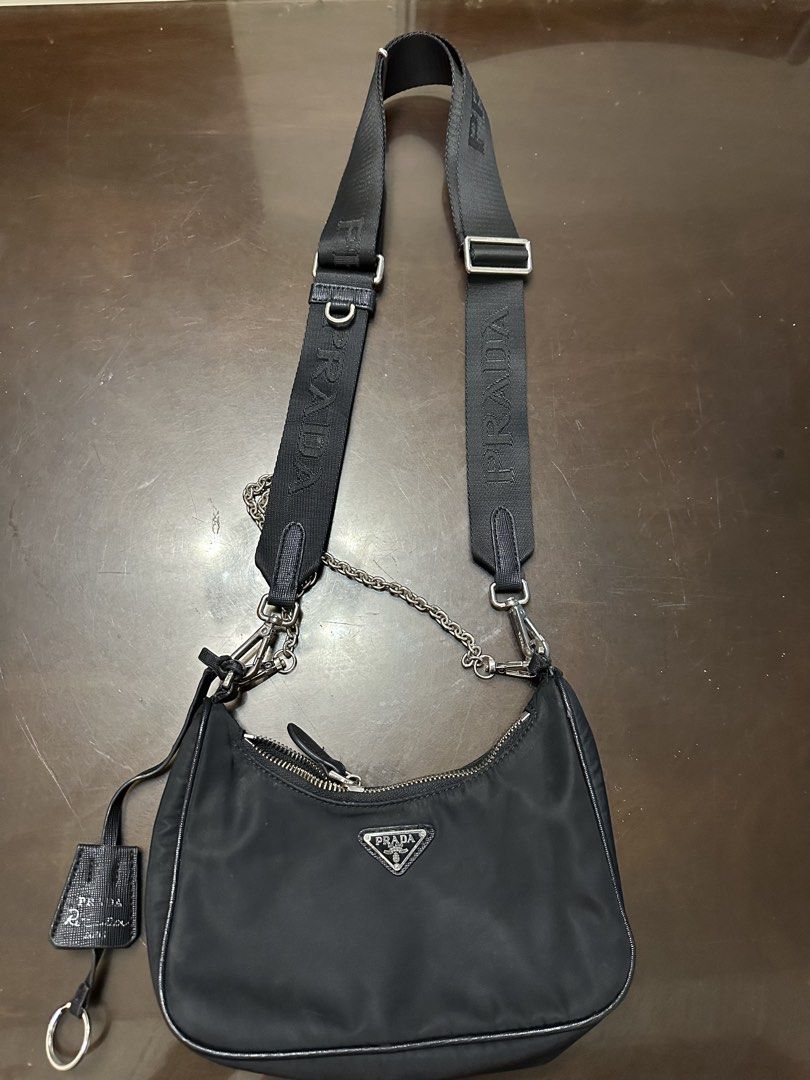 Prada Re-Edition Nylon Crossbody/Shoulder (Category: Luxury Bags & Wallets) located in Butuan. Submitted by wear.next (Listing ID 1443139537, Image 1). Description: Please see last slide for issue No inclusion .
