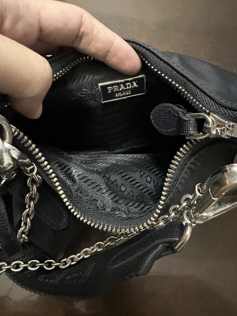 Prada Re-Edition Nylon Crossbody/Shoulder (Category: Luxury Bags & Wallets) located in Butuan. Submitted by wear.next (Listing ID 1443139537, Image 3). Description: Please see last slide for issue No inclusion .