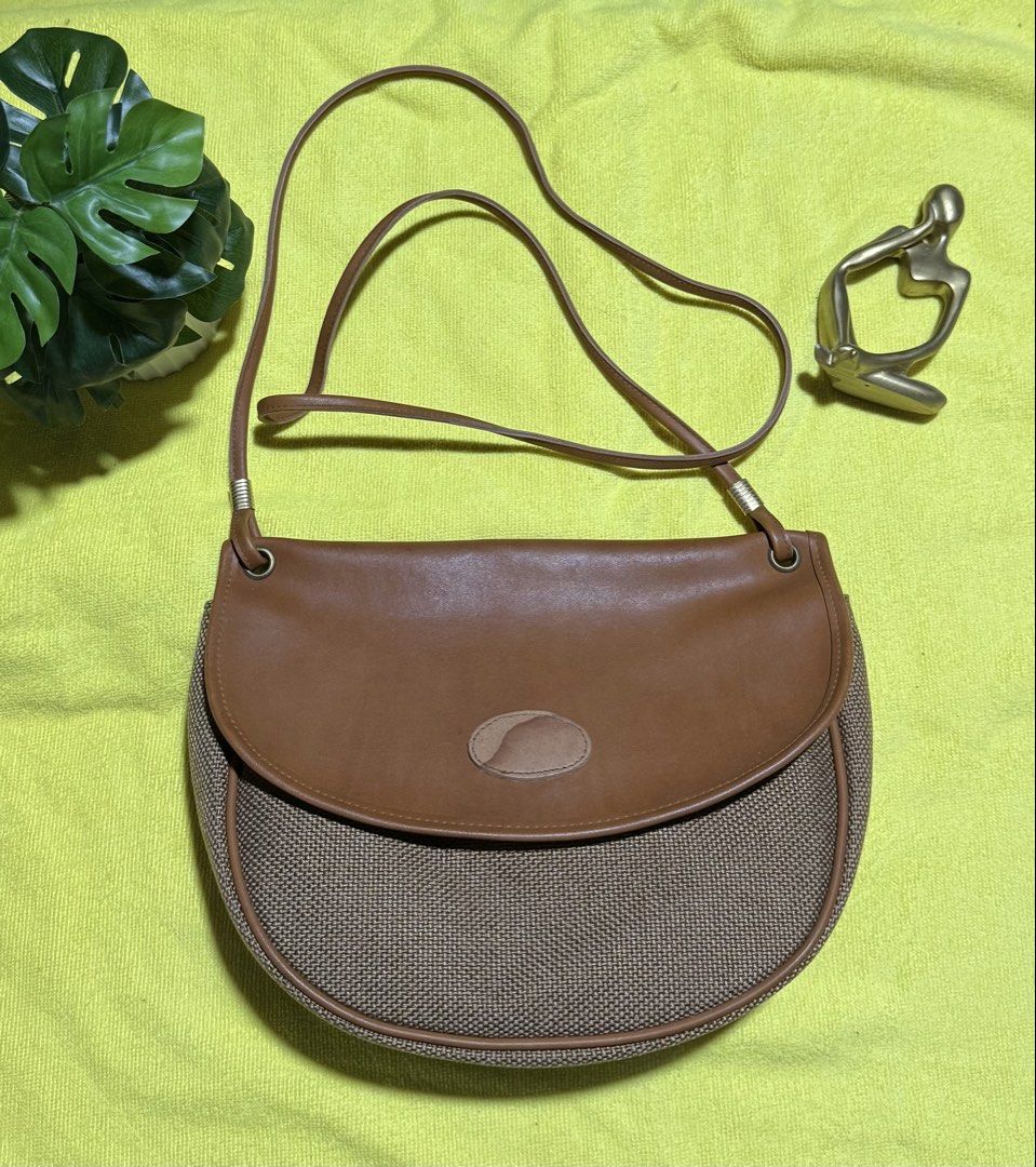 Preloved sling bag from Japan (Category: Cross-body Bags) located in Rizal. Submitted by jayolts (Listing ID 1443288775, Image 1). Description: Sling bag from Japan Parang PU leather pero super new pa no rubs or tears Sling is excellent condition Gold plated hardwares Inner lining leather no bak bak or lag kit Kasya long wallet and big phones ☺️.