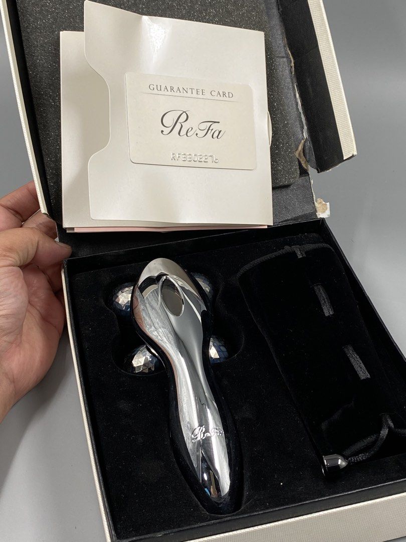 ReFa 4 CARAT Beauty Roller with Guarantee Card (Category: Face Care) located in Baguio. Submitted by treshijos88888-72820 (Listing ID 1443218141, Image 1). Description: - Authentic ReFa 4 CARAT beauty roller - Comes with original box, guarantee card, and instruction manual - Features 4 platinum-coated balls that rotate - Ideal for facial massage and contouring.