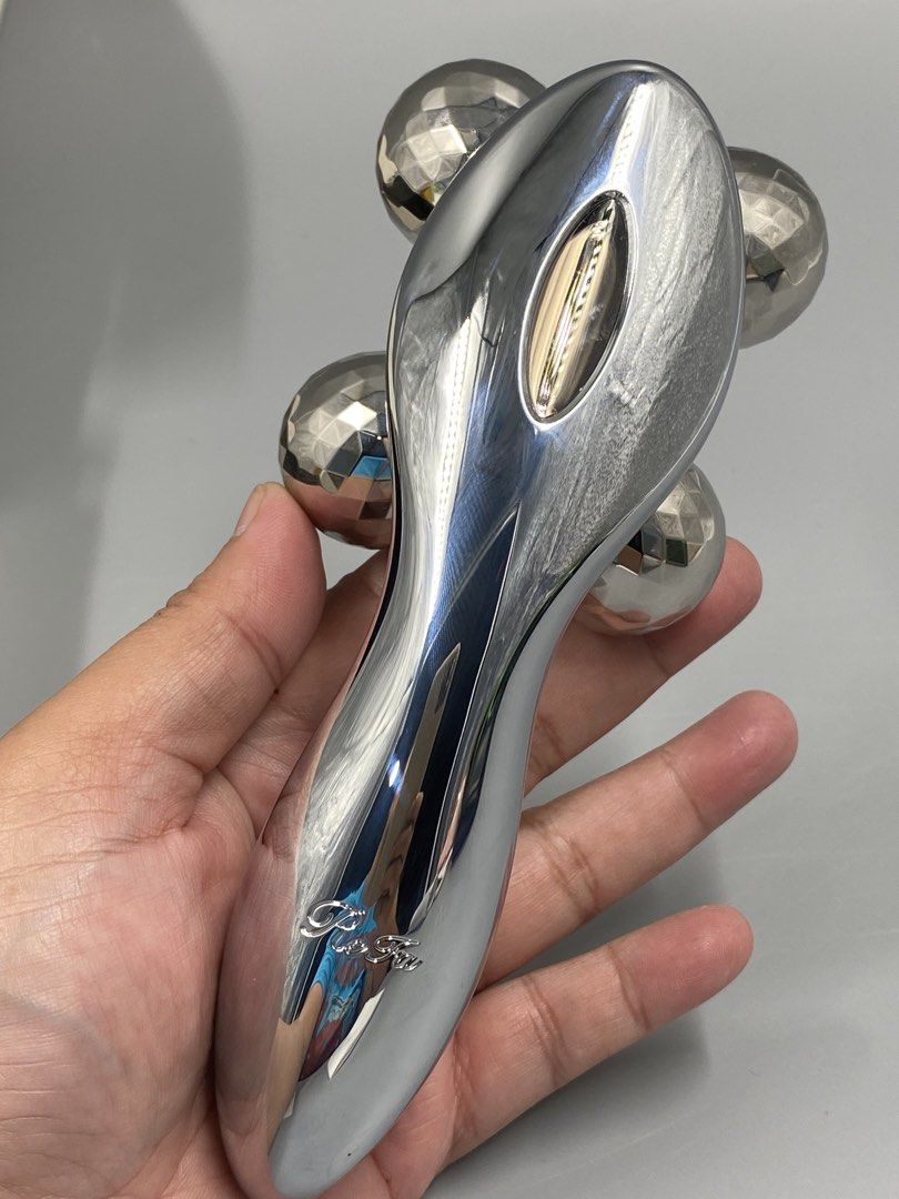 ReFa 4 CARAT Beauty Roller with Guarantee Card (Category: Face Care) located in Baguio. Submitted by treshijos88888-72820 (Listing ID 1443218141, Image 2). Description: - Authentic ReFa 4 CARAT beauty roller - Comes with original box, guarantee card, and instruction manual - Features 4 platinum-coated balls that rotate - Ideal for facial massage and contouring.