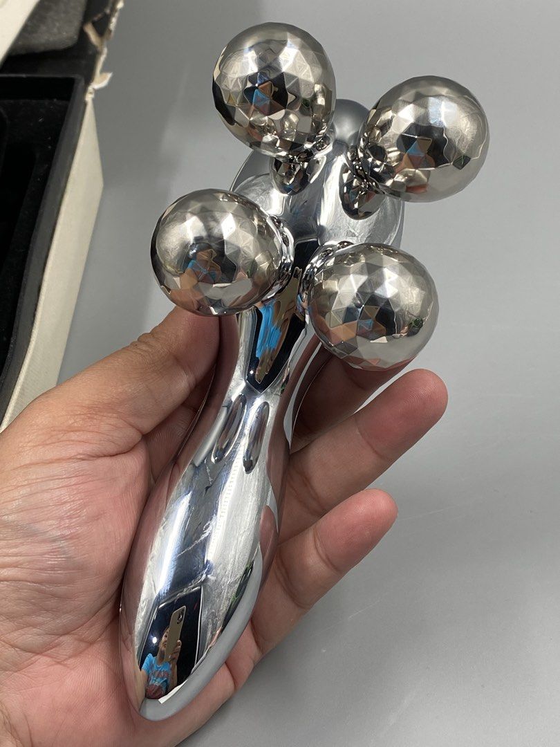 ReFa 4 CARAT Beauty Roller with Guarantee Card (Category: Face Care) located in Baguio. Submitted by treshijos88888-72820 (Listing ID 1443218141, Image 3). Description: - Authentic ReFa 4 CARAT beauty roller - Comes with original box, guarantee card, and instruction manual - Features 4 platinum-coated balls that rotate - Ideal for facial massage and contouring.