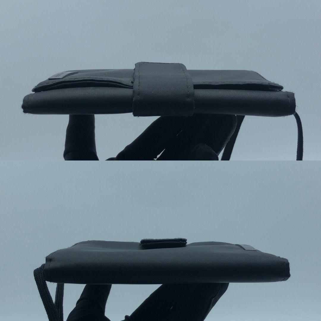 SAMSONITE NYLON BLACK WALLET (Category: Luxury Bags & Wallets) located in Taguig. Submitted by ecoring.ph (Listing ID 1443231130, Image 3). Description: ◆CONDITION: B- ◆DESCRIPTIONS: (Other defects/info:) OUTER: The body of the wallet is stained, dirty, moldy, and shows visible signs of use. INNER: The inside of the wallet is also stained, dirty, and creased, and there is an interior slot with fraying stitches. The clear photo slot of the wallet 