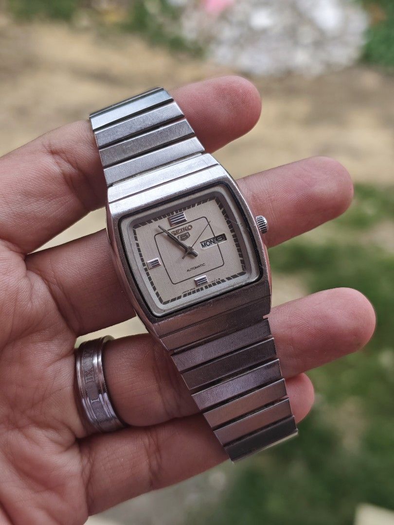 Seiko 5 Tank Automatic (Category: Luxury Watches) located in Tagbilaran City. Submitted by fleetingticks (Listing ID 1443219712, Image 3). Description: - Vintage Seiko automatic watch - Silver tone stainless steel bracelet and case - Square face with day and date complication - Clean dial with simple markers - Runs well - Great for daily wear or collectors.