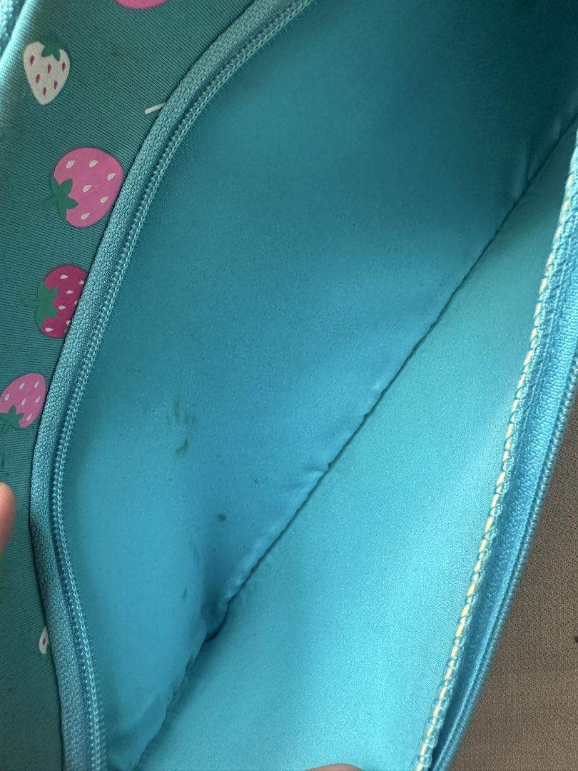 Smiggle Teal Deer & Strawberry Pencil Case (Category: Stationery & School Supplies) located in Muntinlupa City. Submitted by camotepie (Listing ID 1443164046, Image 3). Description: - original but due sa storage may stains. Please manage expectations - Cute teal Smiggle pencil case - Features a fun deer and strawberry design - Main zippered compartment - Smaller zippered section on the front - Interior has some minor marks - Great for stationery 