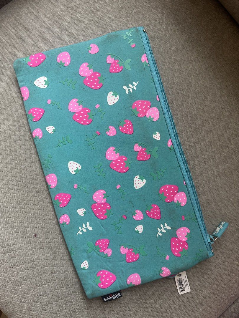 Smiggle Teal Deer & Strawberry Pencil Case (Category: Stationery & School Supplies) located in Muntinlupa City. Submitted by camotepie (Listing ID 1443164046, Image 2). Description: - original but due sa storage may stains. Please manage expectations - Cute teal Smiggle pencil case - Features a fun deer and strawberry design - Main zippered compartment - Smaller zippered section on the front - Interior has some minor marks - Great for stationery 