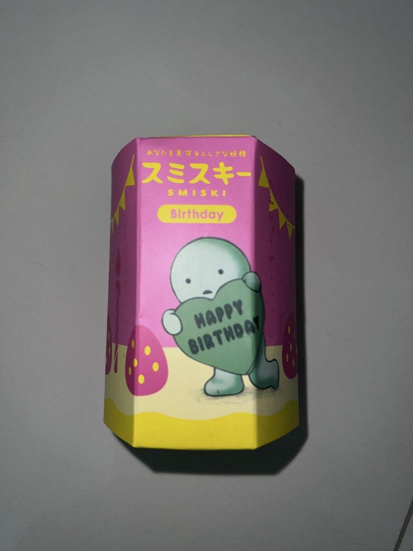 Smiski Birthday Series Blind Box (Category: Designer & Blind Box Toys) located in Singapore. Submitted by lemonjuiced (Listing ID 1443189721, Image 1). Description: - Smiski Birthday blind box - Features a cute Smiski character holding a 'Happy Birthday' heart - Adorable pink and yellow box design with strawberries and candles - Perfect for birthday gifts or Smiski collectors - A fun surprise toy!.