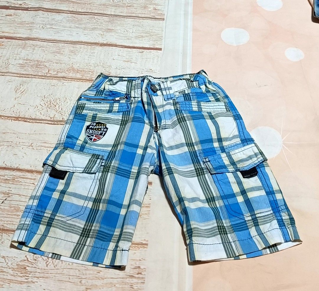 Snoopy Plaid Cargo Shorts Blue White (Category: Babies & Kids Fashion) located in Davao. Submitted by fabmegashop (Listing ID 1443241207, Image 1). Description: - Adorable Snoopy shorts for kids - Classic blue and white plaid design - Functional cargo pockets on the sides - Comfortable elastic waistband - Ideal for casual wear and playtime - Measurements available in the photos.