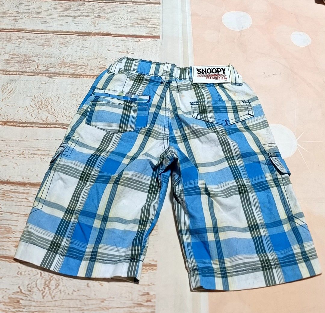 Snoopy Plaid Cargo Shorts Blue White (Category: Babies & Kids Fashion) located in Davao. Submitted by fabmegashop (Listing ID 1443241207, Image 2). Description: - Adorable Snoopy shorts for kids - Classic blue and white plaid design - Functional cargo pockets on the sides - Comfortable elastic waistband - Ideal for casual wear and playtime - Measurements available in the photos.