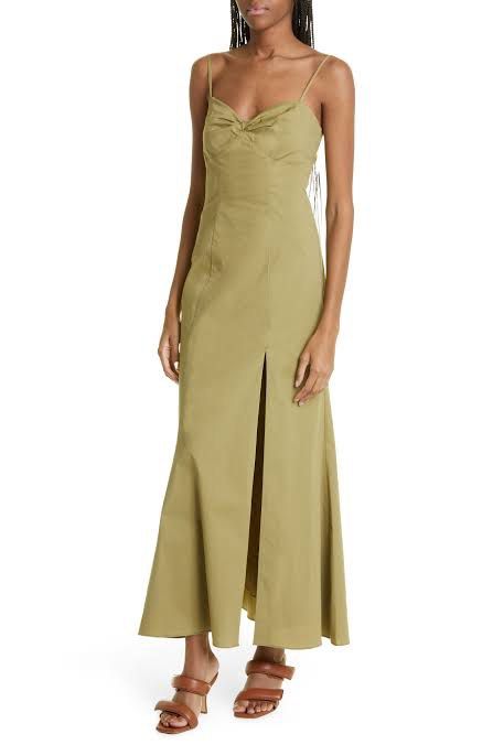 Staud Natalie Midi Dress (Category: Dresses) located in Quezon City. Submitted by bagelll18 (Listing ID 1443133871, Image 1). Description: Worn once only - Olive green maxi dress - Features a flattering twist detail at the bust - Elegant spaghetti straps - High slit on the side for a touch of allure - Adjustable ties at the back for a perfect fit - Ideal for summer events, parties, or a night out.