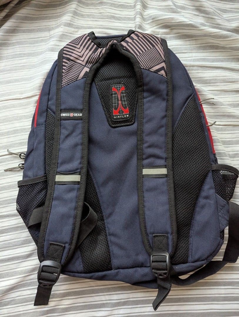 Swiss Gear Backpack Navy Blue Geometric Pattern (Category: Backpacks) located in Porac. Submitted by themightythrift (Listing ID 1443169108, Image 2). Description: - Swiss Gear backpack in navy blue - Stylish geometric pattern - Multiple compartments and pockets for organization - Padded shoulder straps and back panel for comfort - Side mesh pockets for water bottles - Ideal for school, work, or travel.