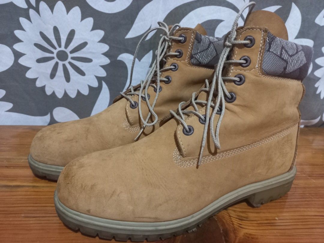 Timberland Lace-up Boots 11W (Category: Boots) located in Baguio. Submitted by highticket75 (Listing ID 1443160327, Image 1). Description: - Classic wheat suede boots - Lace-up style with padded collar - Unique patterned fabric lining - Durable, ready-to-wear soles - Ideal for casual outfits -Major scraping/ scuffings on toebox -Beaters.