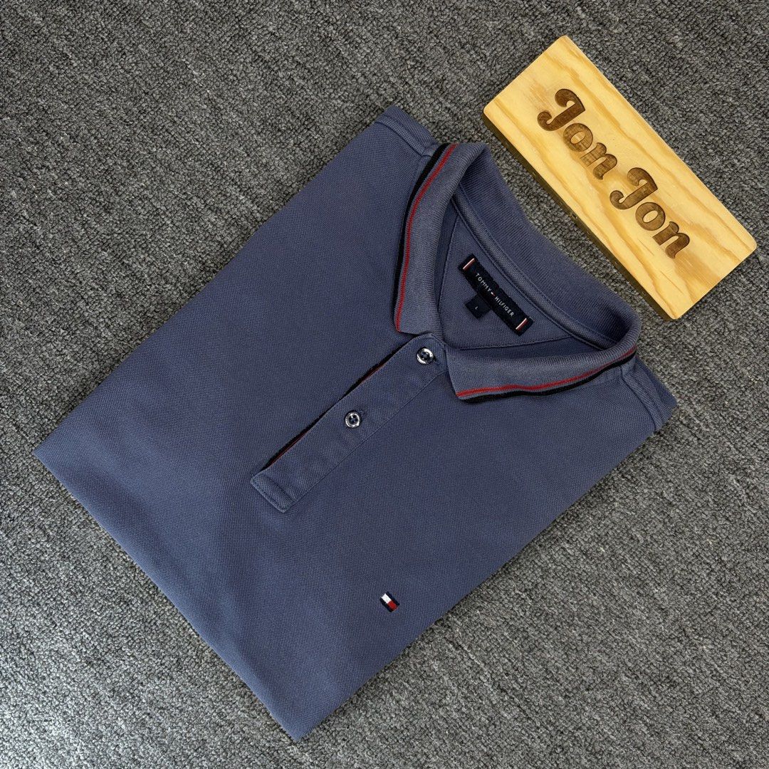 (Sale) Tommy Hilfiger (Category: Tshirts & Polo Shirts ) located in Cavite. Submitted by onebeancent (Listing ID 1443309048, Image 2). Description: 🔘T0m.my Hil Size: Large Dimension: 21" Width | 27" Length Color: Slate Blue Color Rate: 9/10 Issue: None Condition: Verygood to Excellent Before : 480php Now: 350php Additional Shipping Fee (J&T Small Pouch) 75php Luzon 100php visayas 120php mindanao.