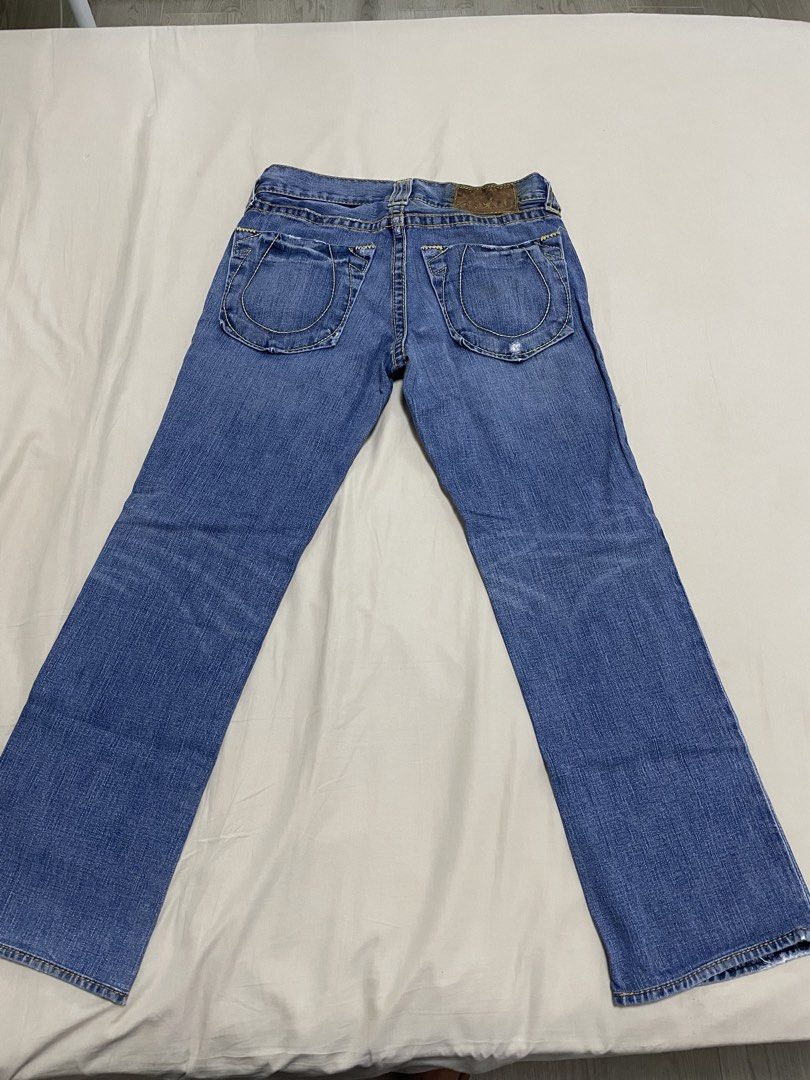 True Religion Jeans Blue Denim Straight Leg Men's Size (Category: Jeans) located in Angeles City. Submitted by lukemafinds (Listing ID 1443230428, Image 2). Description: - Brand: True Religion - Color: Blue Denim - Fit: Straight Leg - Closure: Button Fly - Features: Classic stitching detail on pockets - Material: 100% Cotton - Style: Great for everyday wear - Details: Please check photos for exact measurements and condition. -original - Size 30 w