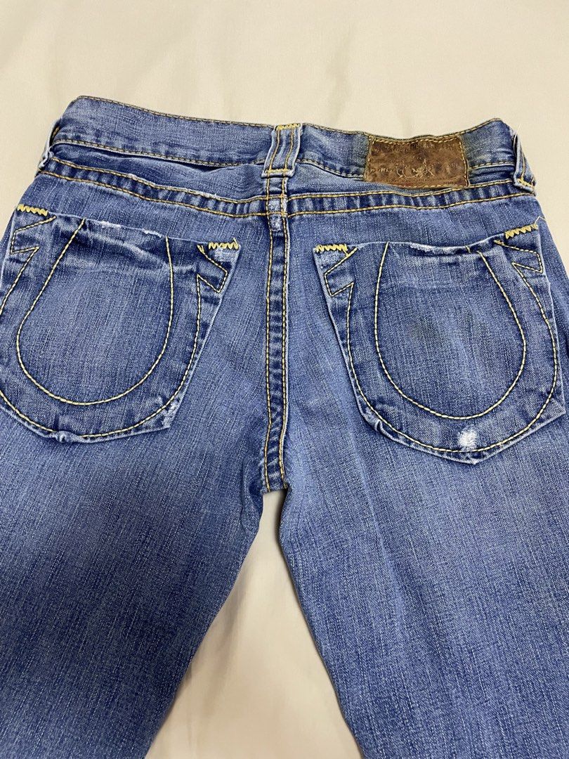 True Religion Jeans Blue Denim Straight Leg Men's Size (Category: Jeans) located in Angeles City. Submitted by lukemafinds (Listing ID 1443230428, Image 3). Description: - Brand: True Religion - Color: Blue Denim - Fit: Straight Leg - Closure: Button Fly - Features: Classic stitching detail on pockets - Material: 100% Cotton - Style: Great for everyday wear - Details: Please check photos for exact measurements and condition. -original - Size 30 w
