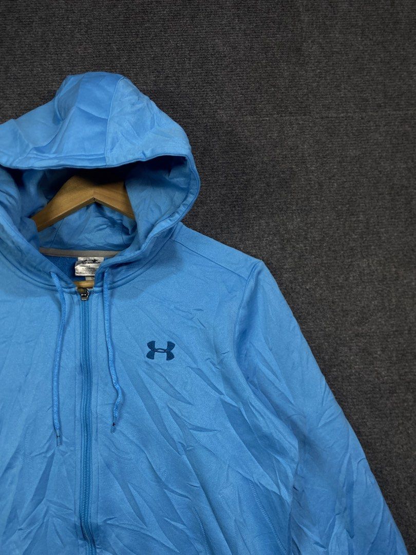 Under Armour Blue Zip-Up Hoodie (Category: Coats, Jackets and Outerwear) located in Bolinao. Submitted by frenced28 (Listing ID 1443264604, Image 2). Description: Wide:19 length:24 - Blue Under Armour Zip-Up Hoodie - Size: Large (L) - Material: 60% Cotton, 40% Polyester - Origin: Made in Malaysia - Features: Hood, Pockets - Perfect for Workouts or Casual Wear.