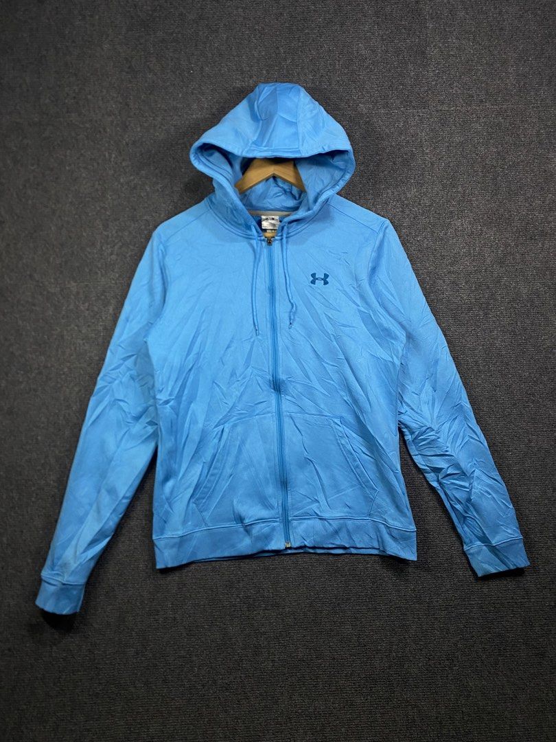 Under Armour Blue Zip-Up Hoodie (Category: Coats, Jackets and Outerwear) located in Bolinao. Submitted by frenced28 (Listing ID 1443264604, Image 1). Description: Wide:19 length:24 - Blue Under Armour Zip-Up Hoodie - Size: Large (L) - Material: 60% Cotton, 40% Polyester - Origin: Made in Malaysia - Features: Hood, Pockets - Perfect for Workouts or Casual Wear.