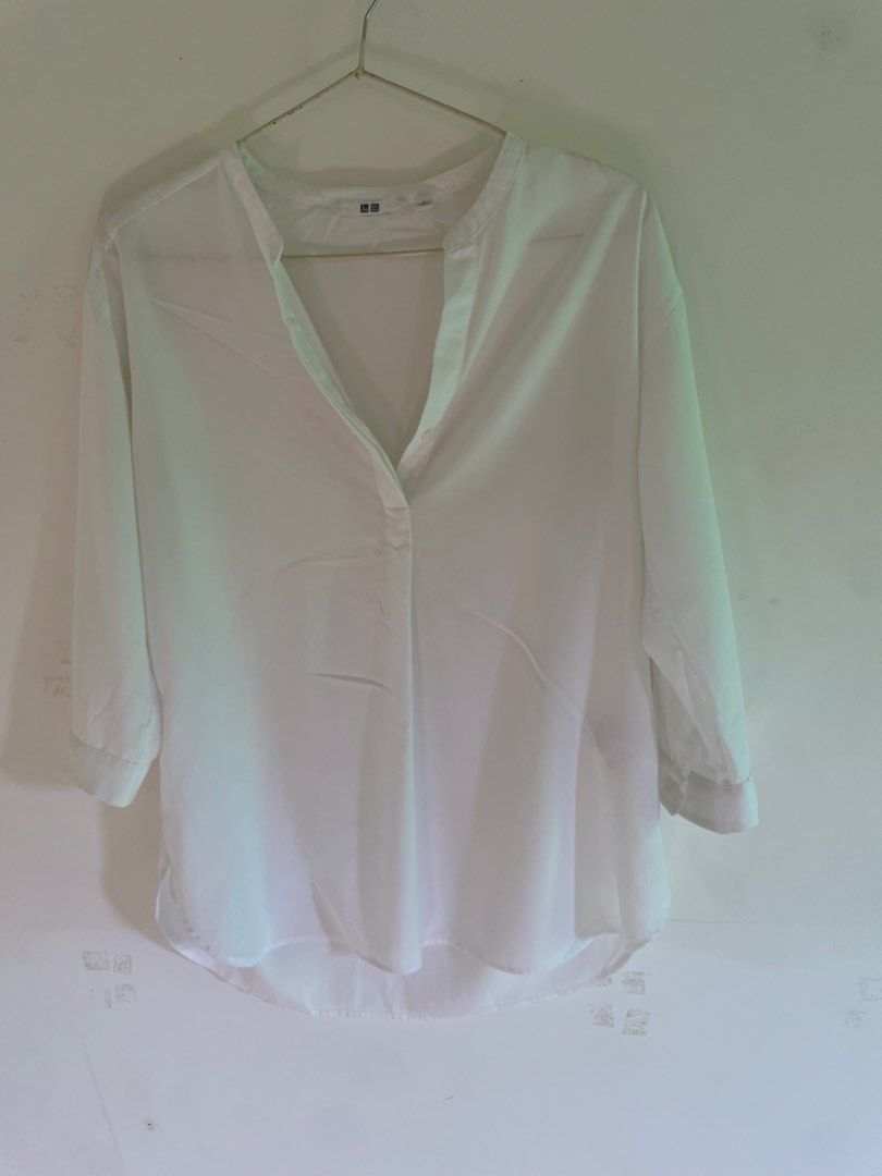 Uniqlo white 3/4 sleeves (Category: Blouses) located in Manolo Fortich. Submitted by pbangot (Listing ID 1443317986, Image 1). Description: Used twice Still in very good condition S-M.